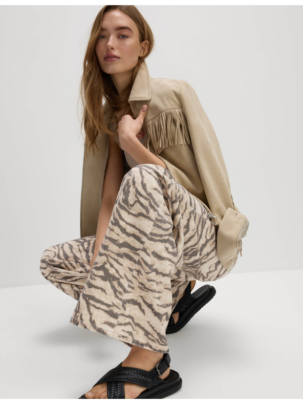 Marks & Spencer Džínsy so širokými nohavicami a zvieracou potlačou Marks & Spencer