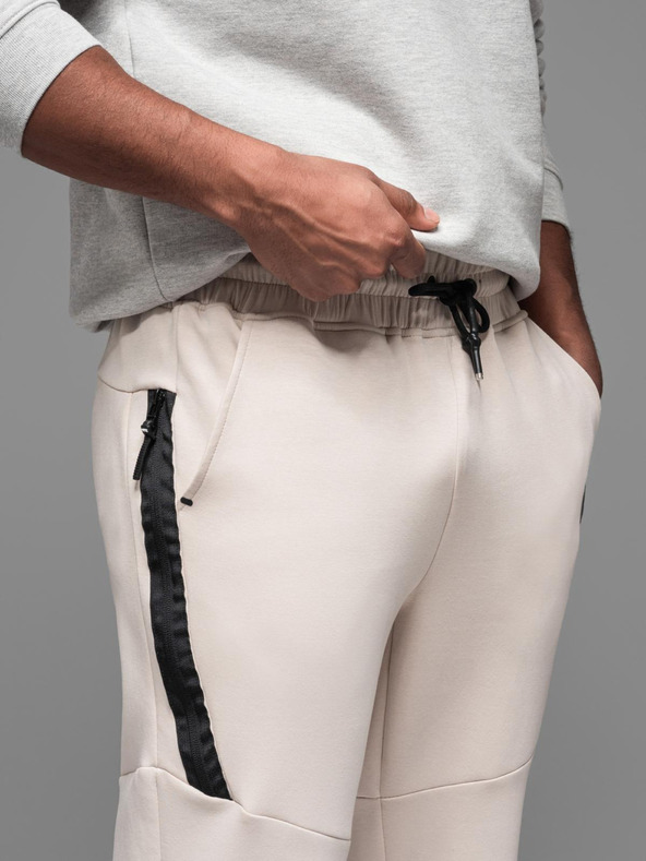 Ombre Clothing Moške športne hlače z rebrastimi manšetami in okrasno zadrgo - peščene Ombre Clothing
