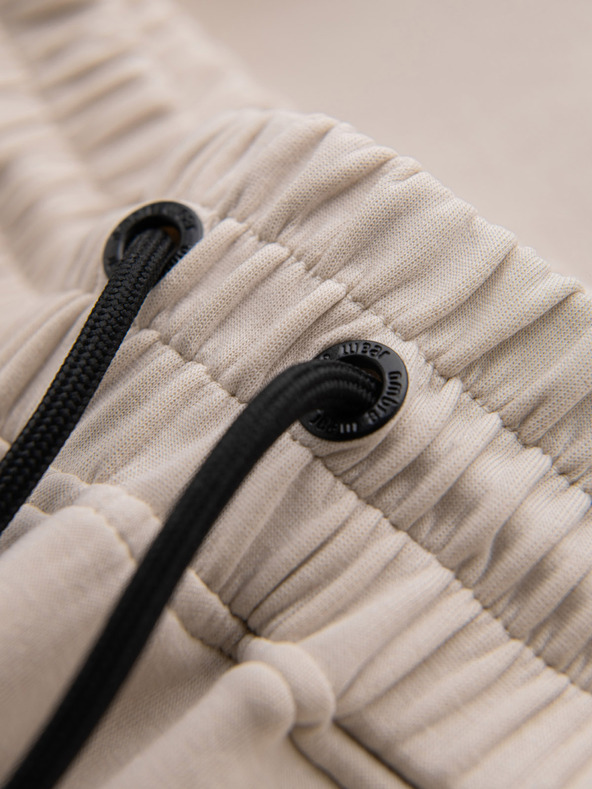 Ombre Clothing Moške športne hlače z rebrastimi manšetami in okrasno zadrgo - peščene Ombre Clothing