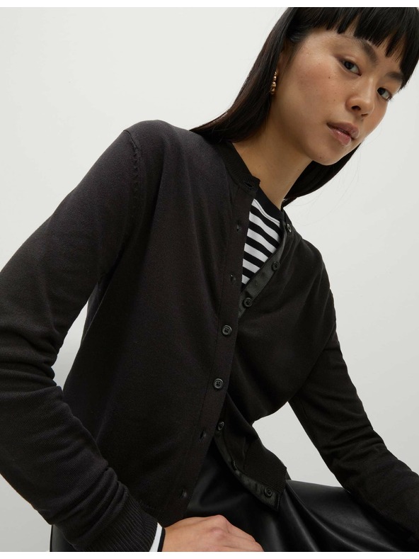 Marks & Spencer Marks & Spencer jopica z okroglim vratom in gumbi spredaj črna