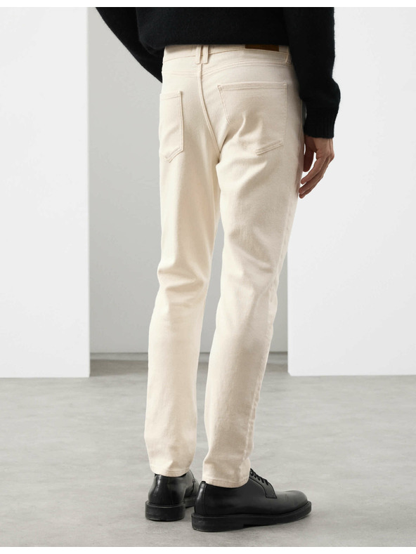 Marks & Spencer Italijanske kavbojke slim fit Marks & Spencer smetanova