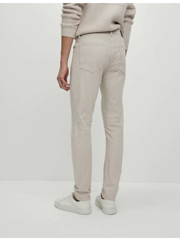 Marks & Spencer Raztegljive kavbojke ozkега kroja z 360° razteznostjo Marks & Spencer bež