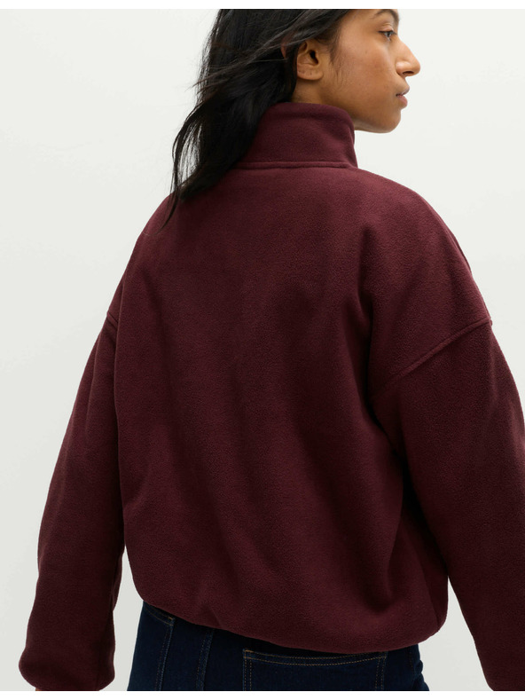 Marks & Spencer Flis jopica z zadrgo pri vratu Marks & Spencer rdeča