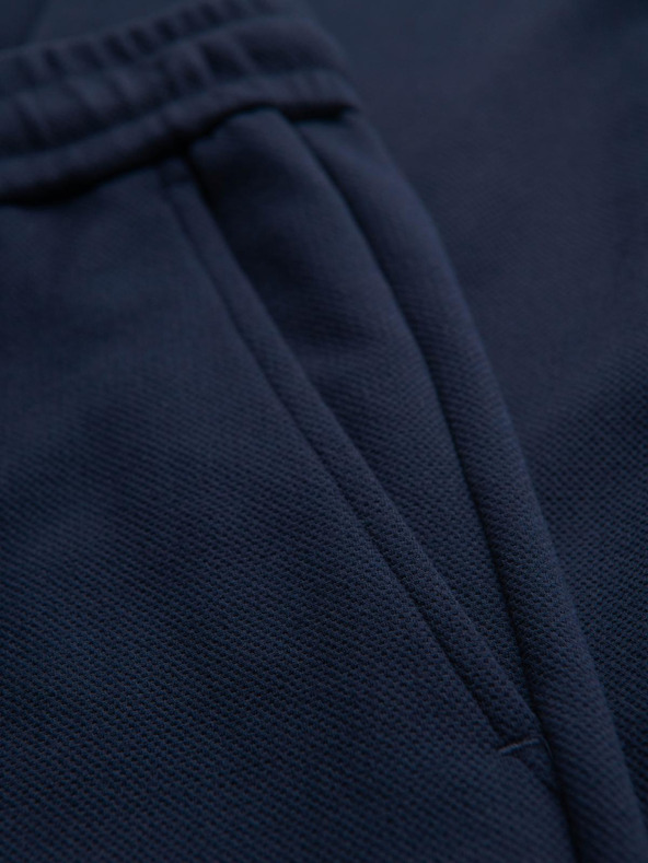 Ombre Clothing Moške hlače iz piqué pletenine z nastavljivo pasom - temno modre V1 OM-PACP-0283 Ombre Clothing