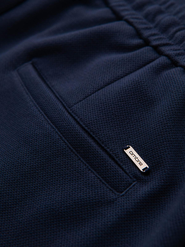 Ombre Clothing Moške hlače iz piqué pletenine z nastavljivo pasom - temno modre V1 OM-PACP-0283 Ombre Clothing
