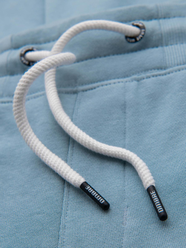 Ombre Clothing Svetlomodre moške trenirke Ombre oblačila