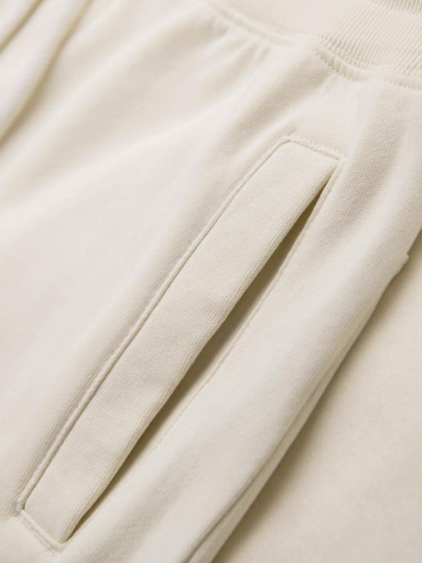 Ombre Clothing Moške trenirke BASIC z rebrasto nogavico - smetanaste V11 OM-PABS-0305 Ombre Clothing