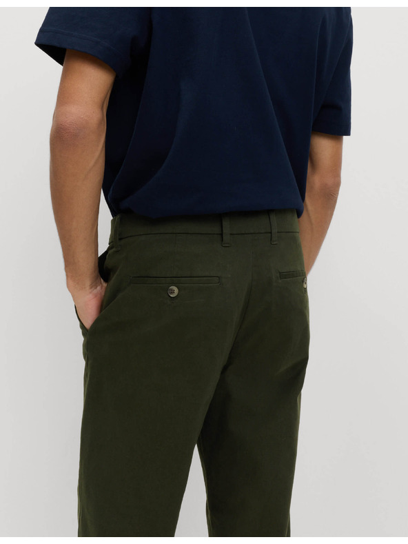 Marks & Spencer Raztegljive hlače chino običajnega kroja Marks & Spencer zelena