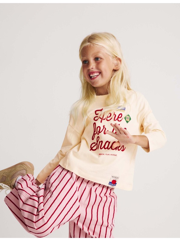 Marks & Spencer Top iz čistega bombaža s napisom "For The Snacks" (2–8 let) Marks & Spencer kremasta